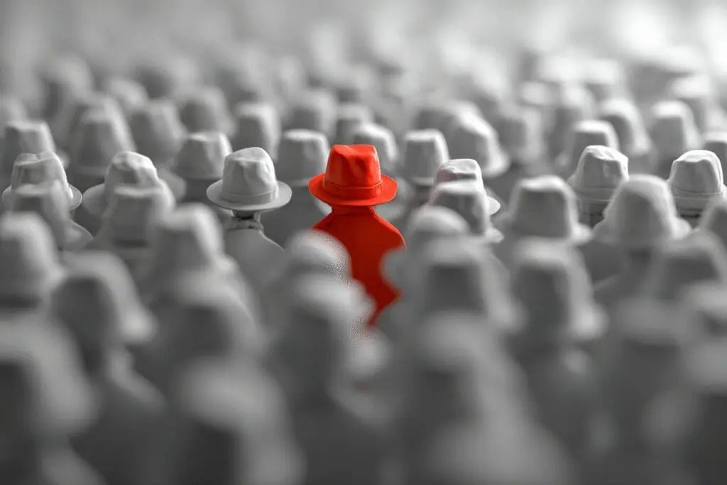 An avatar wearing a unique red hat in a crowd a visual guide for the FAQ on what is the KreekCrafts Roblox username An avatar wearing a unique red hat in a crowd a visual guide for the FAQ on what is the KreekCrafts Roblox username